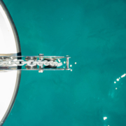 The anchor and chain of a boat anchored on sand in the crystal-clear waters of Mallorca, without damaging the posidonia seagrass.